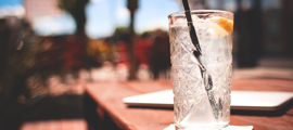 cold drink in tall glass on table