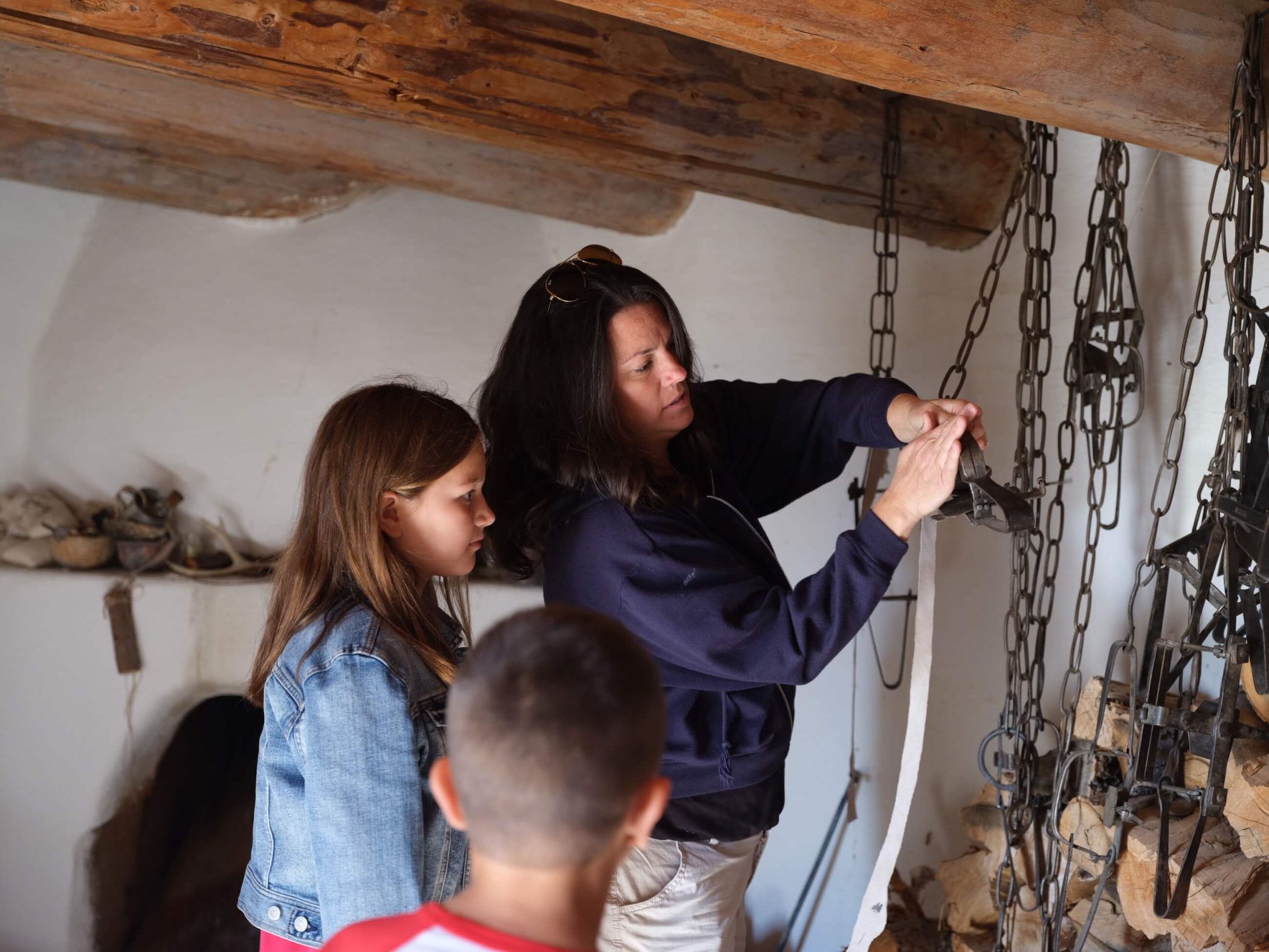 Family exploring Bent's Fort