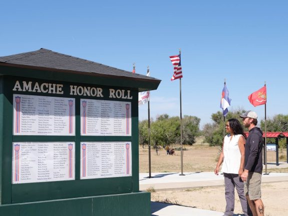 Two visitors exploring the Amache Honor Roll